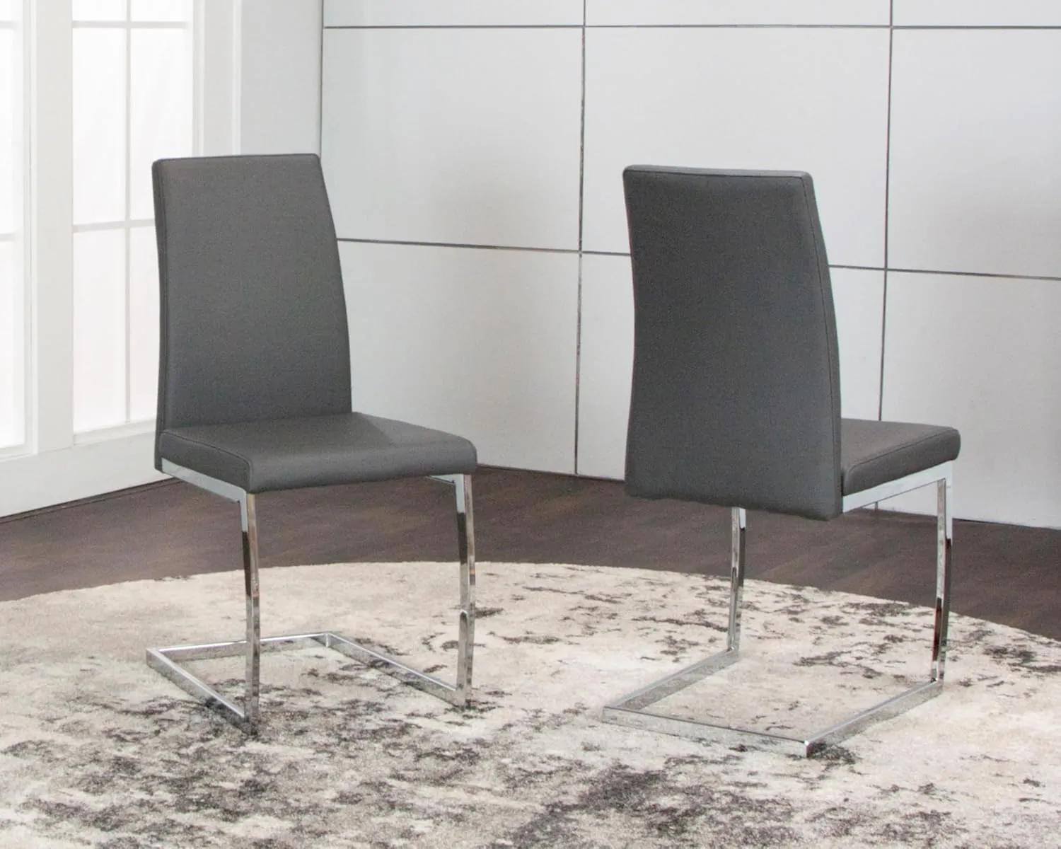 Sunset Trading Sela Upholstered Breuer Dining Chairs | S-Shaped Chrome Cantilever Base | Charcoal Gray Padded Faux Leather Seats | Set of 2 | Contemporary, Modern Kitchen Seating